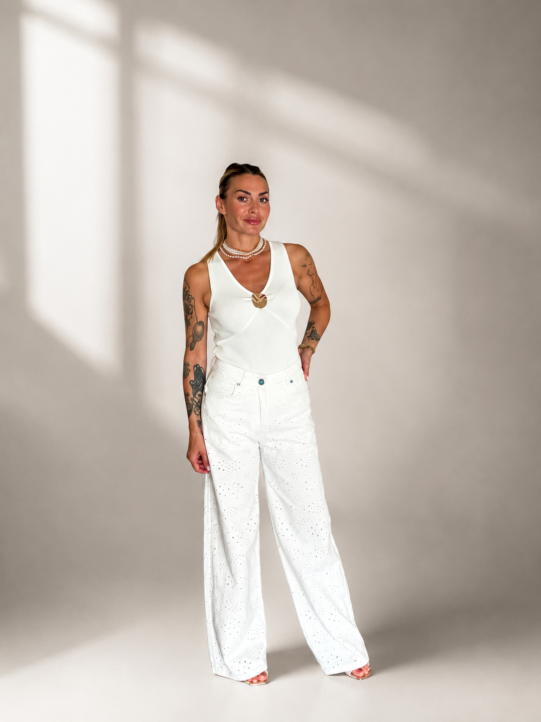 Jeans bianco in pizzo sangallo donna